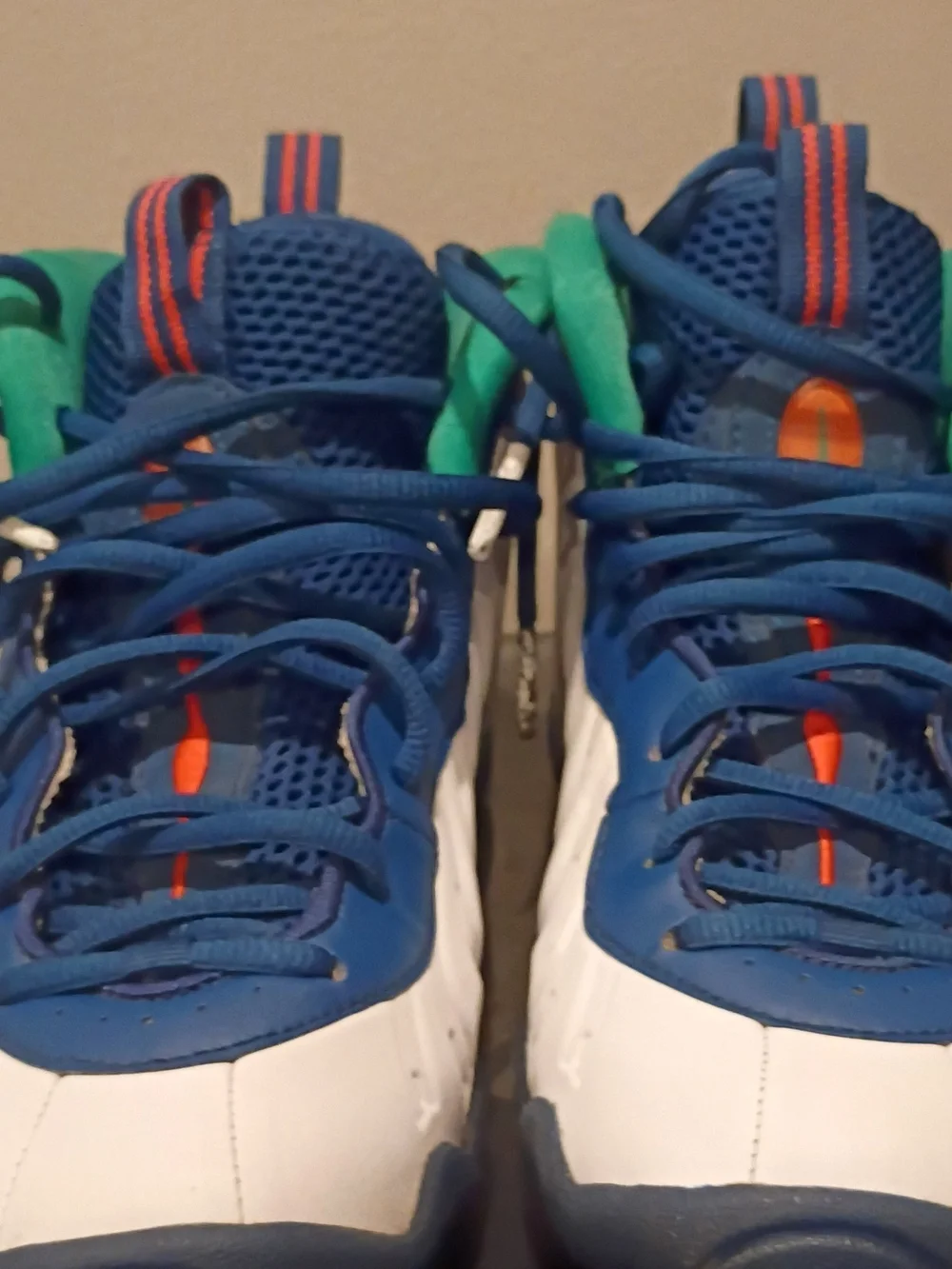 Nike Kids White and Blue Sneakers with Green and Orange Accents